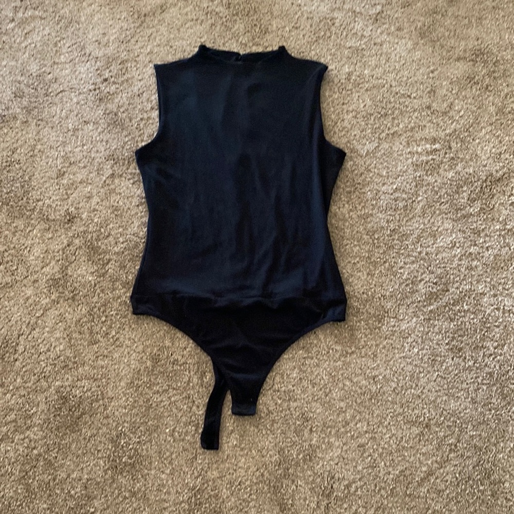 Lulu’s black mock neck thong bodysuit